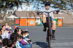 Jeff Lenosky puts on a trials show for students at Highland Elementary School in Seaside California April 6, 2022.